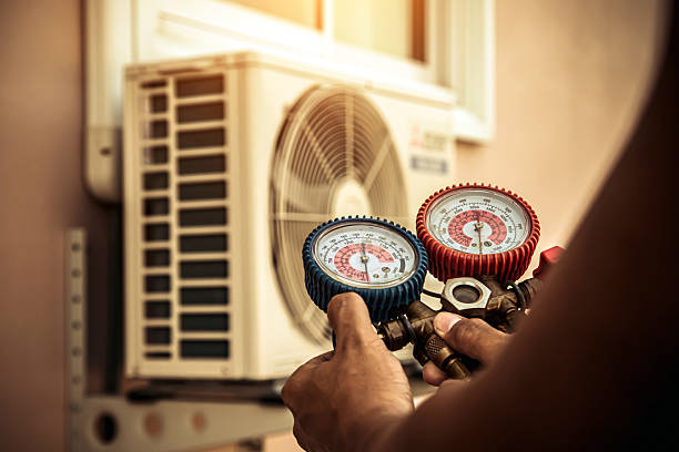 Professional Hvac technician working in Roggen, CO